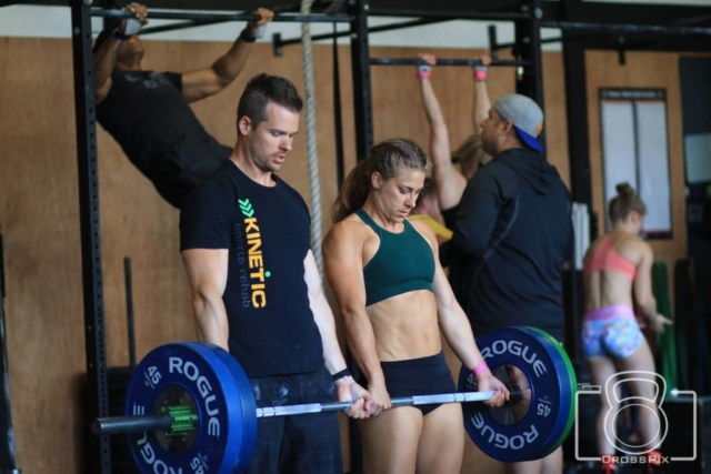 Joe and Emily doing partner deadlifts at the Devotion Summer Games
