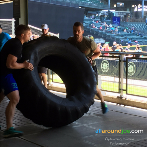 Doing a few tire flips with Kurt Garceau at the Battle of the Ballpark