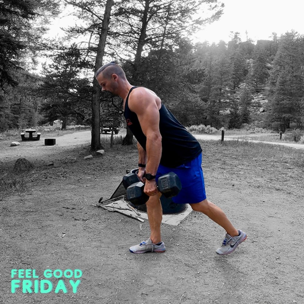 Joe doing single leg deadlifts at the campsite next to fire pit