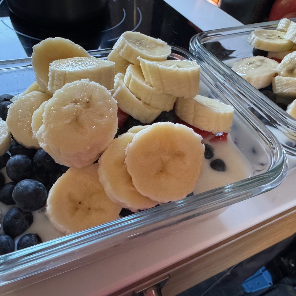 Our everyday breakfast of oatmeal, berries and a banana with organic whole milk